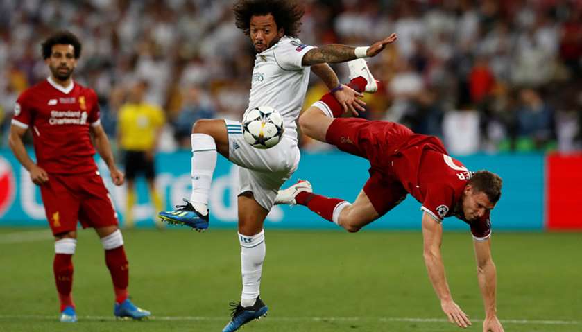 Real Madrid\'s Marcelo in action with Liverpool\'s James Milner in UEFA Champions League final