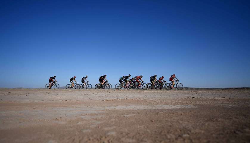 Competitors ride their bikes during Stage 4 of the 13th edition of the Titan Desert 2018 mountain bi