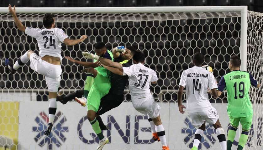 Al-Sadd\'s goalkeeper Saad al-Sheeb defends an attemp on goal