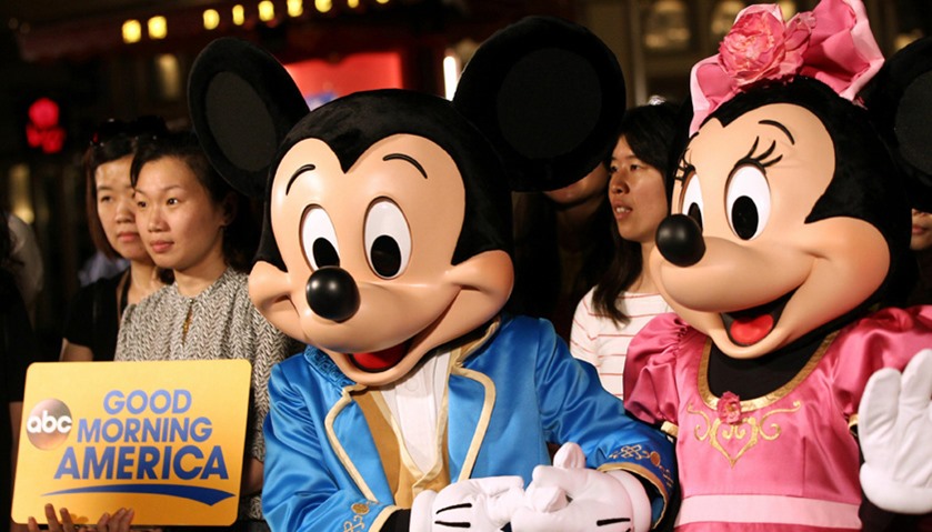 Disney characters Mickey (L) and Minnie Mouse are seen at Shanghai Disney Resort