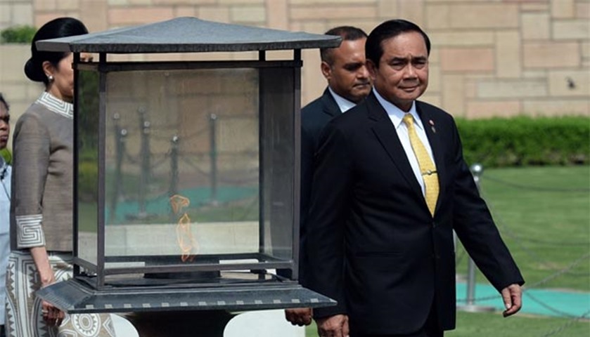 Prayut Chan-O-Cha pays tribute at the Rajghat memorial for Mahatma Gandhi in New Delhi on Friday