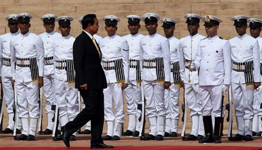 Prayut Chan-O-Cha inspects the guard of honour during a ceremonial reception in New Delhi