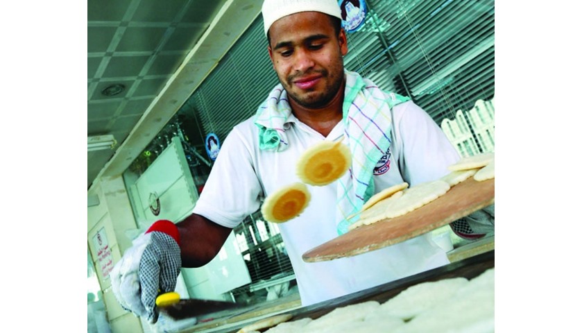 Traditional Ramadan delicacy Qatayef being prepared at a bakery in Doha. PICTURE: Jayan Orma