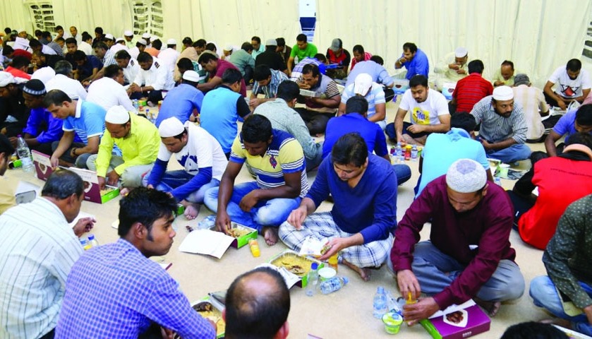 People having the free Iftar meal at one of the tents in Doha. PICTURE: Jayan Orma.