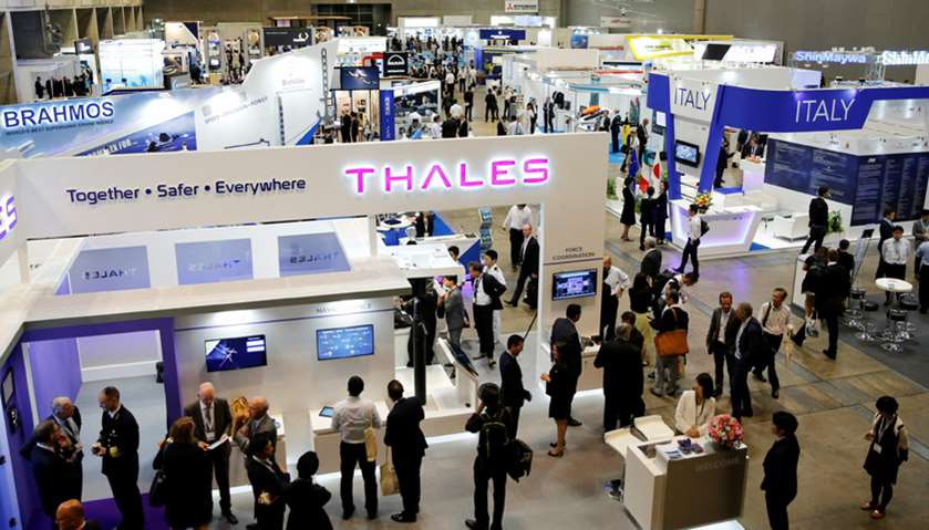 Visitors are seen at the Maritime Air Systems and Technologies Asia (MAST) show in Chiba, Japan