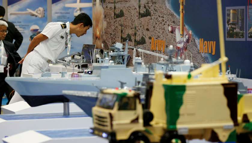 A visitor is seen at India\'s Brahmos\' booth at the MAST show in Chiba