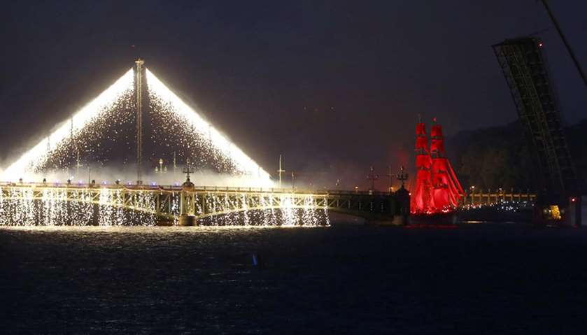 Sweden\'s brig Tre Kronor with scarlet sails floats on the Neva river during the Scarlet Sails festiv