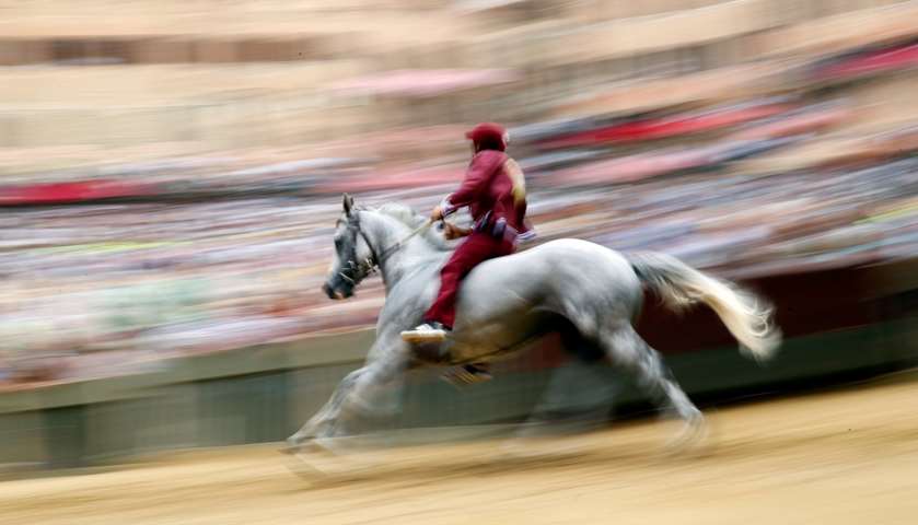 Jockey Sebastian Murtas of \'Torre\' (Tower) parish rides his horse