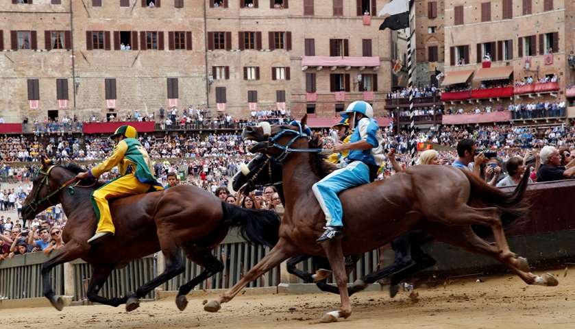 Jockey Giovanni Atzeni of \'Onda\' (Wave) parish rides his horse

