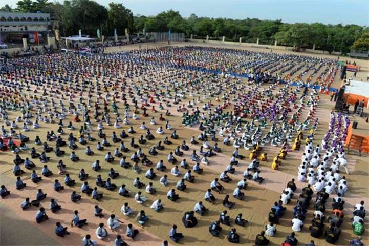 Indian school students take part in a yoga camp in Hyderabad