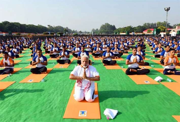 Indian Prime Minister Narendra Modi taking part in a yoga session in Dehradun