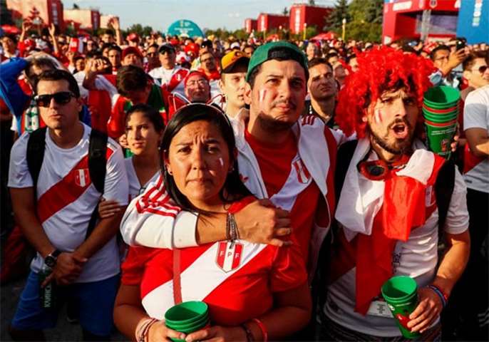 Peru fans react as they watch the match against France at Moscow Fan Fest
