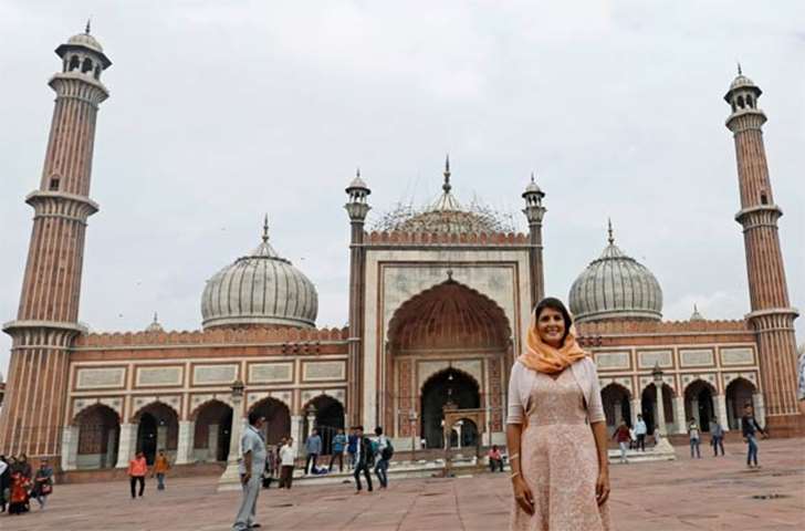 Nikki Haley poses for a photograph during her visit to the Jama Masjid in Delhi on Thursday