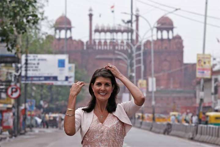 Nikki Haley poses in front of the historic Red Fort in the old quarters of Delhi on Thursday