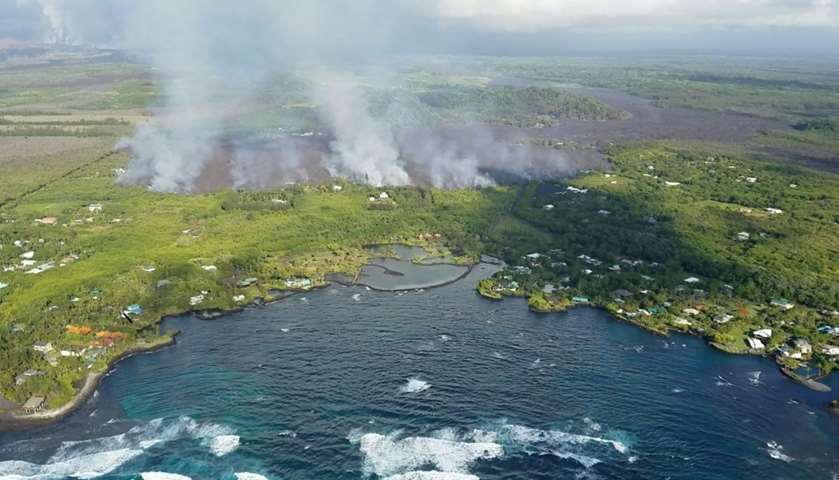 The fumes and the flowfront from Kilauea Volcano
