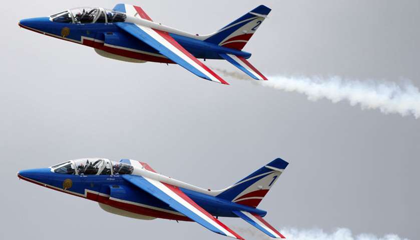 French Air Force Patrouille de France teams are seen during a training, on the eve of the opening of