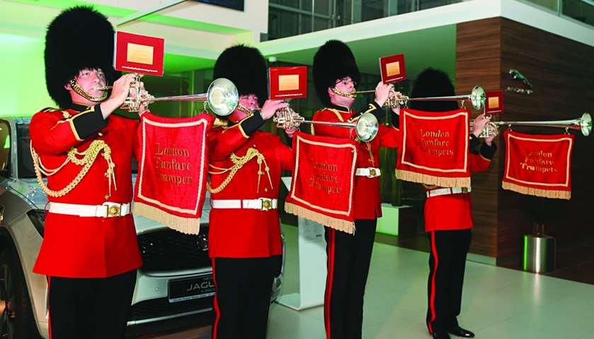 Members of the London Fanfare Trumpets perform at the opening