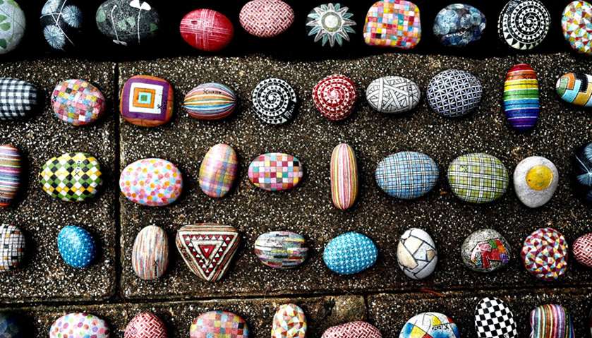 Colourfully painted stones painted by artist Wu Rong-bi, also as know as \"Uncle Stone\"
