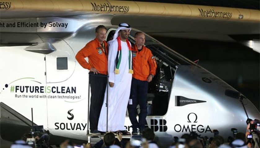 Andre Borschberg (left) and Bertrand Piccard pose with Sultan Ahmed al-Jaber in Abu Dhabi on Tuesday