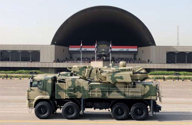 An Iraqi military vehicle is seen during the celebration in Baghdad