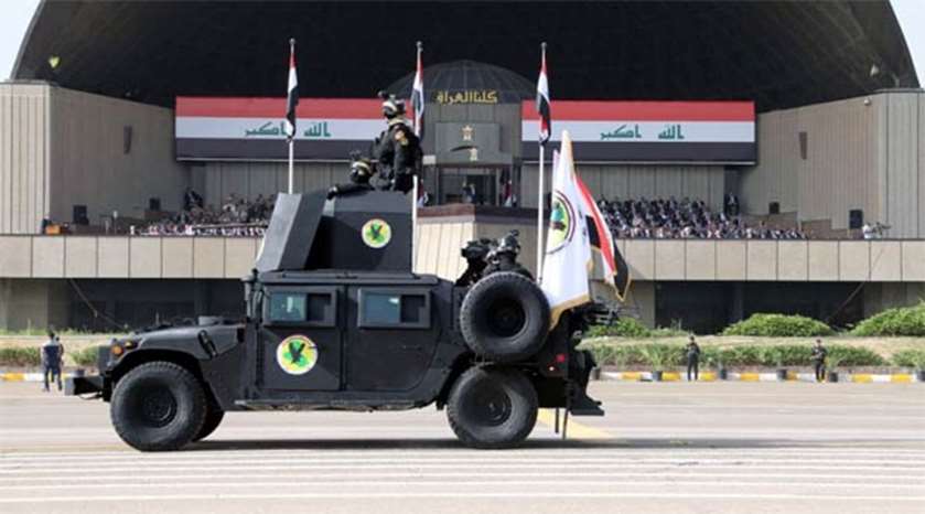 An Iraqi military vehicle is seen during a parade in Baghdad on Saturday
