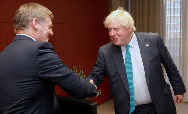 Boris Johnson shakes hands with New Zealand Prime Minister Bill English in Wellington on Tuesday