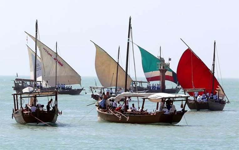 Kuwaiti sailors prepare to sail away in dhows on a pearl diving trip
