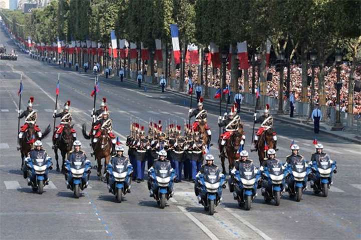 French Republican Guards take part in the military parade on Champs-Elysees