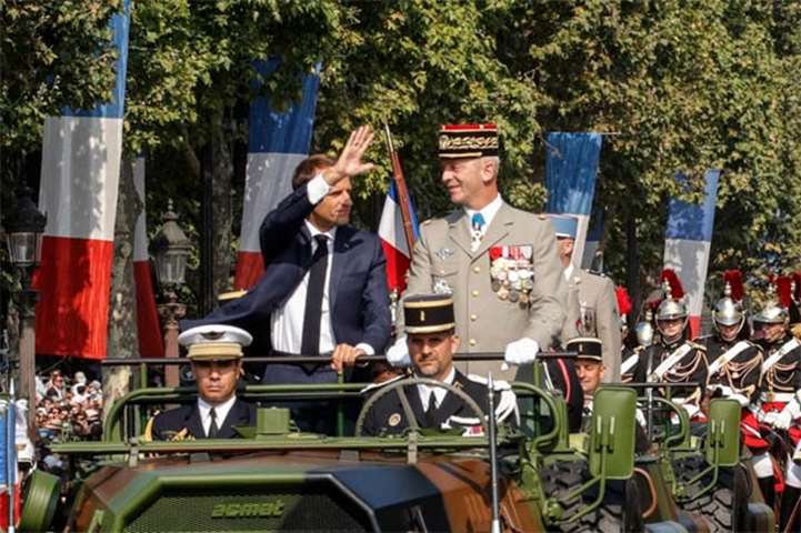 President Macron and Chief of the Defence Staff General Francois Lecointre take part in the parade