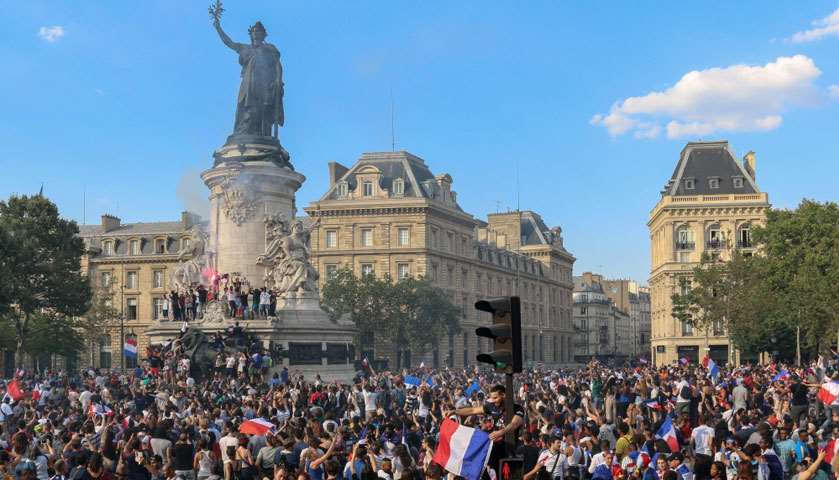 People celebrate on the Place de la Republique