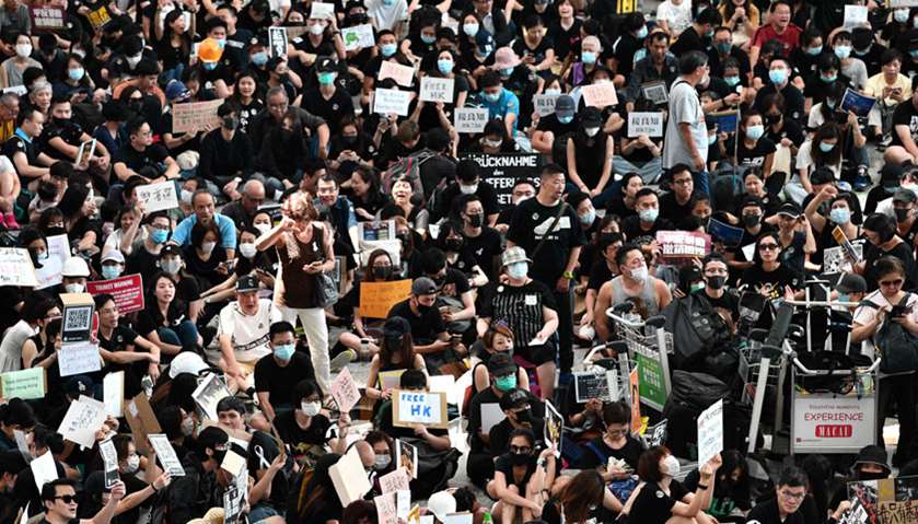 People demonstrate during a protest against the Yuen Long attacks in Yuen Long, New Territories
