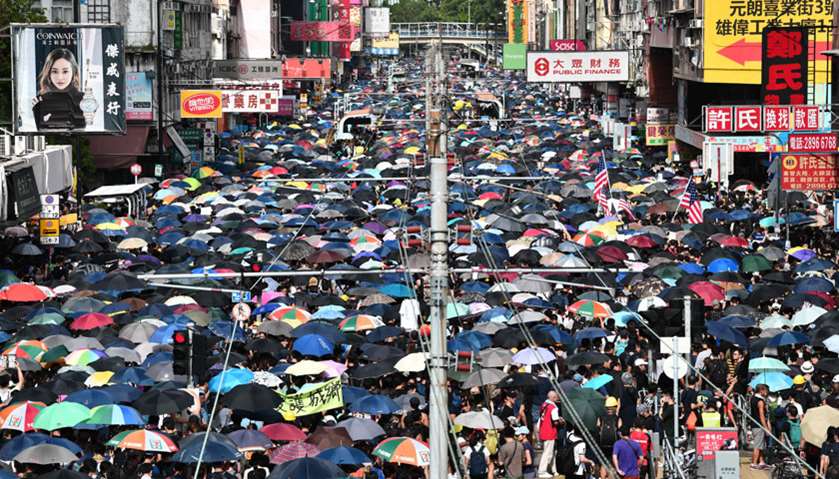 Protesters demonstrate in the district of Yuen Long in Hong Kong
