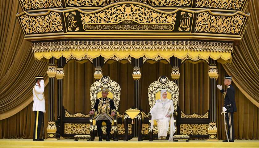 Malaysia\'s King Abdullah Ri\'ayatuddin and Queen being saluted during his royal coronation at the Nat