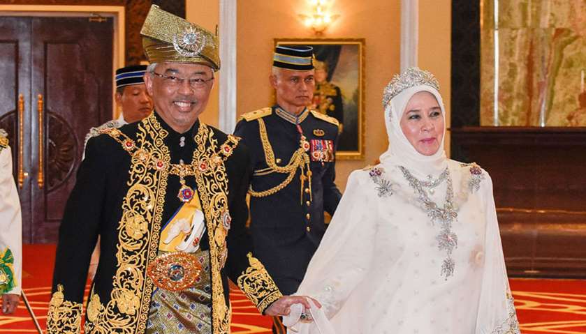 Malaysia\'s King Abdullah Ri\'ayatuddin Al-Mustafa  holding hands with Queen