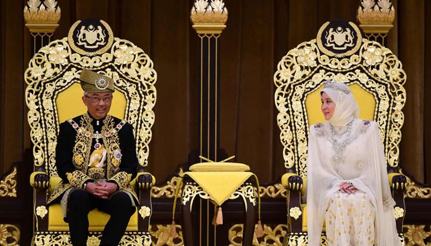 Malaysia\'s King Abdullah Ri\'ayatuddin and Queen Tunku Hajah attending his royal coronation