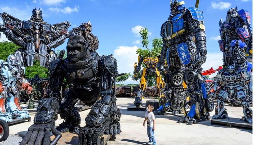 A child looking at a figure of King Kong