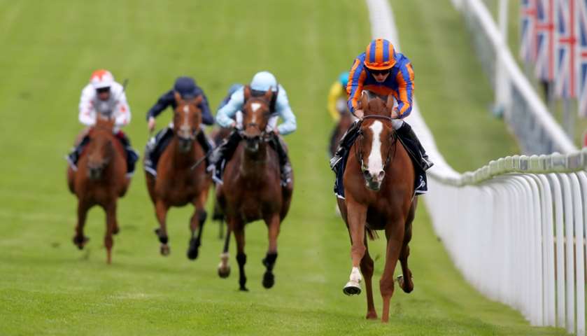 Love ridden by Ryan Moore wins the Investec Oaks