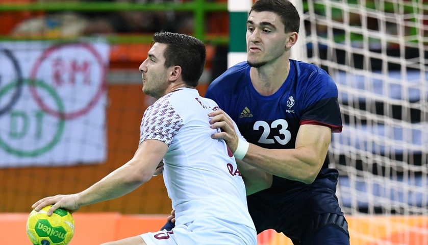 France\'s Ludovic Fabregas challenges Qatar\'s Eldar Memisevic