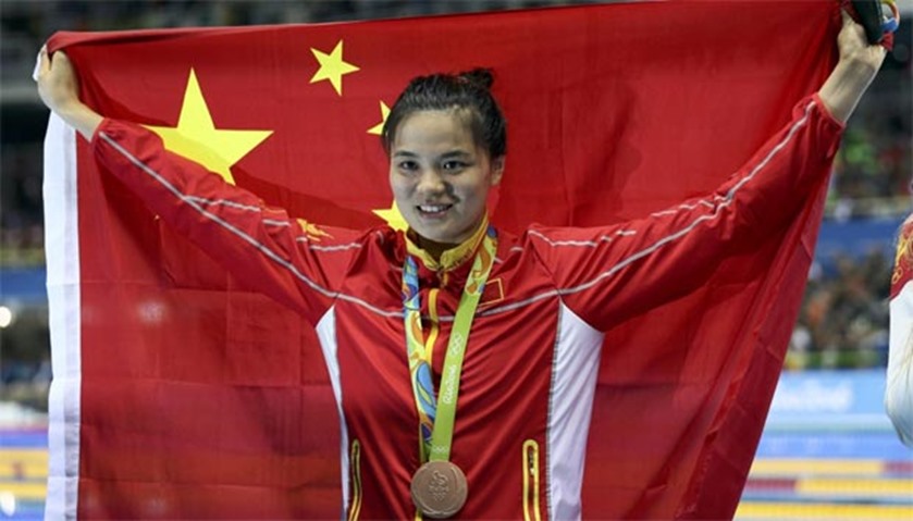 Shi Jinglin of China celebrates her win in the women\'s 200m breaststroke  

