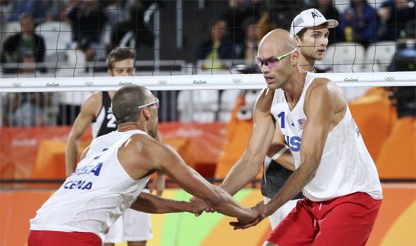 Nick Lucena and Philip Dalhausser of USA celebrate their win in beach volleyball\'s round of 16