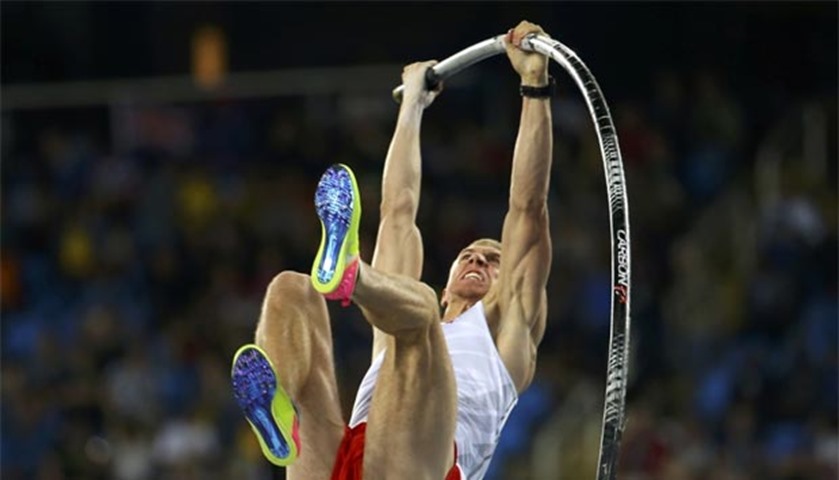 Piotr Lisek of Poland competes in men\'s pole vault qualifying round