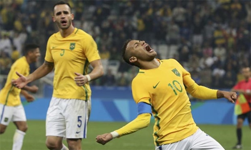 Neymar and Renato Augusto of Brazil celebrate victory in the football quarterfinal against Colombia