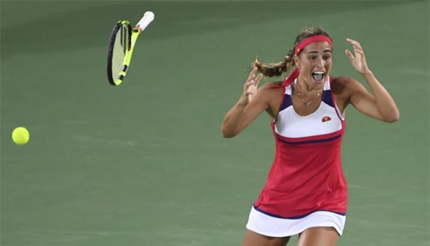 Puerto Rico\'s Monica Puig reacts after winning her singles final tennis against Angelique Kerber