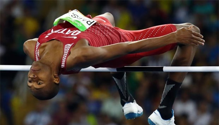 Track and field athlete Mutaz Essa Barshim competes in the men’s high jump final