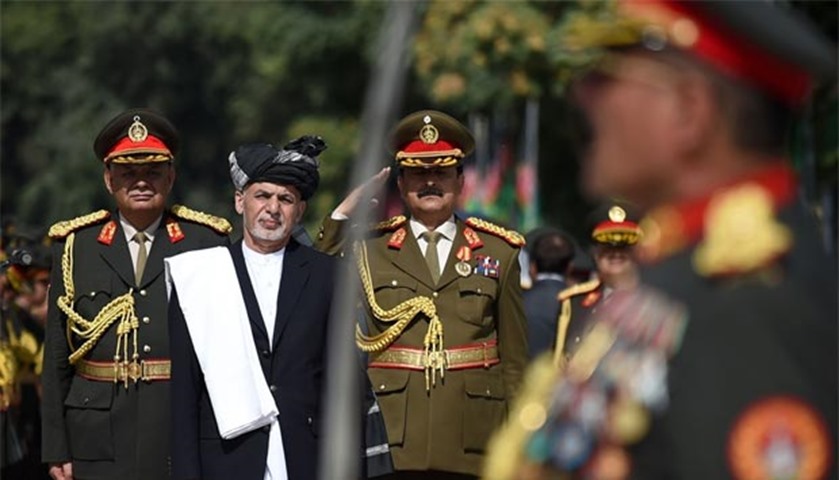 President Ghani looks on as he inspects a guard of honour at the Ministry of Defence compound

