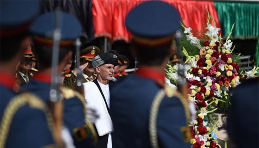 President Ashraf Ghani inspects a guard of honour during the celebrations in Kabul    

