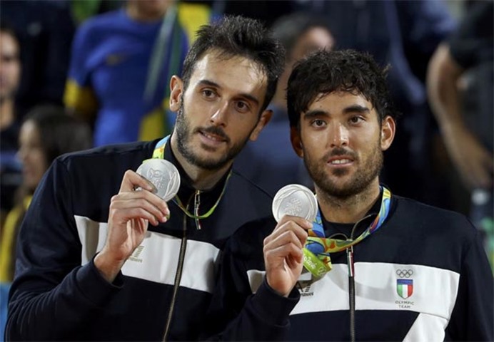 Paolo Nicolai and Daniele Lupo of Italy with their silver medals in men\'s beach volleyball

