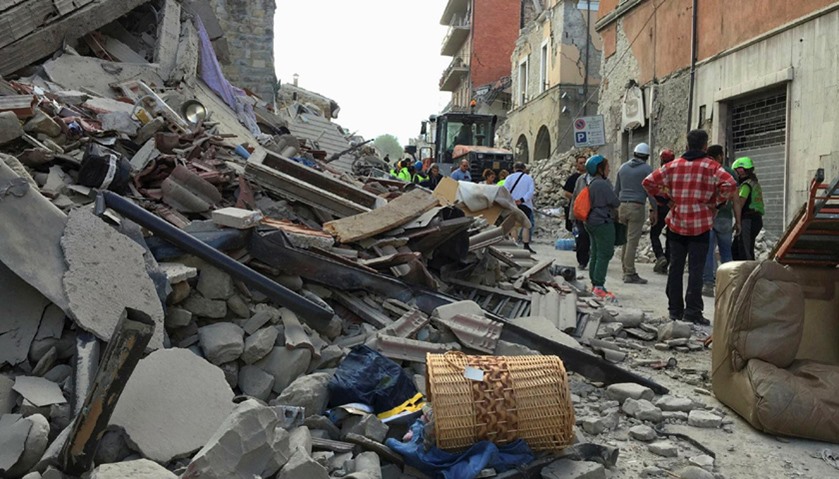 Rescuers work following an earthquake that hit Amatrice, central Italy