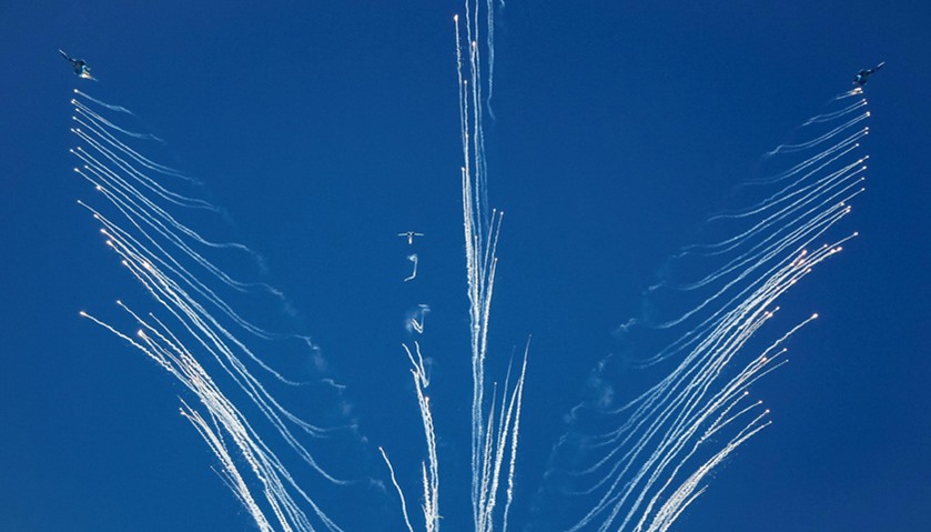 Russian-made Sukhoi Su-27 fighters of Kazakhstan Air Force drop flares