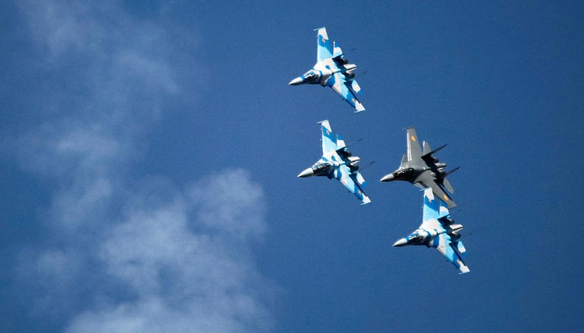 Russian-made Sukhoi Su-27 and Su-30 (back) fighters of Kazakhstan Air Force
